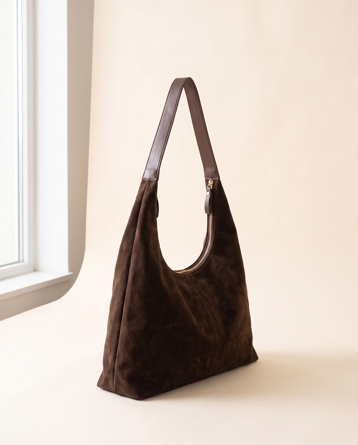 Laurel Shoulder in chocolate, side view by a window